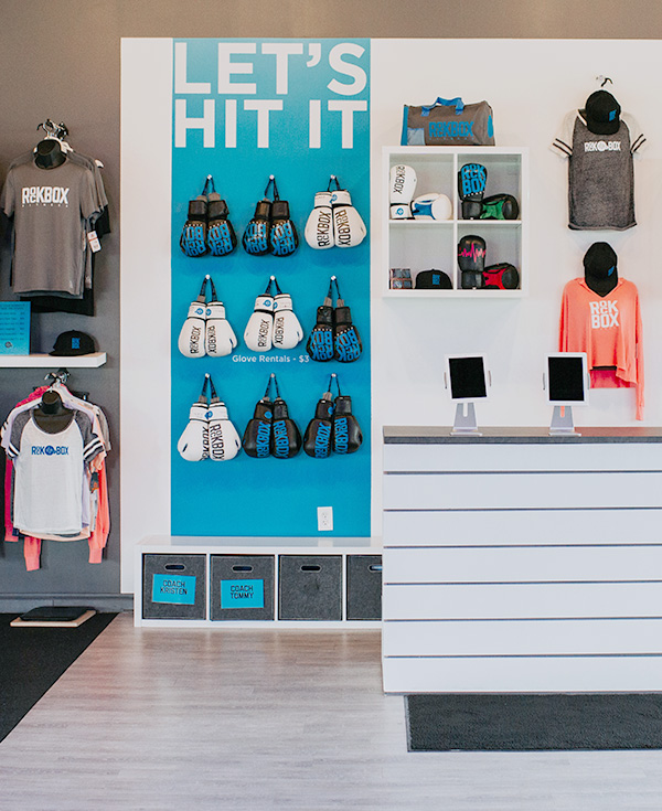 rockbox branded gear hanging in one of their boxing gyms